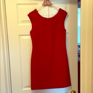 Women’s red dress with deep v back opening